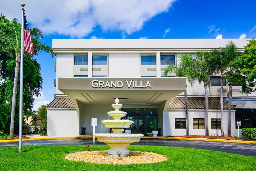 front entrance with fountain at Grand Villa of Boynton Beach