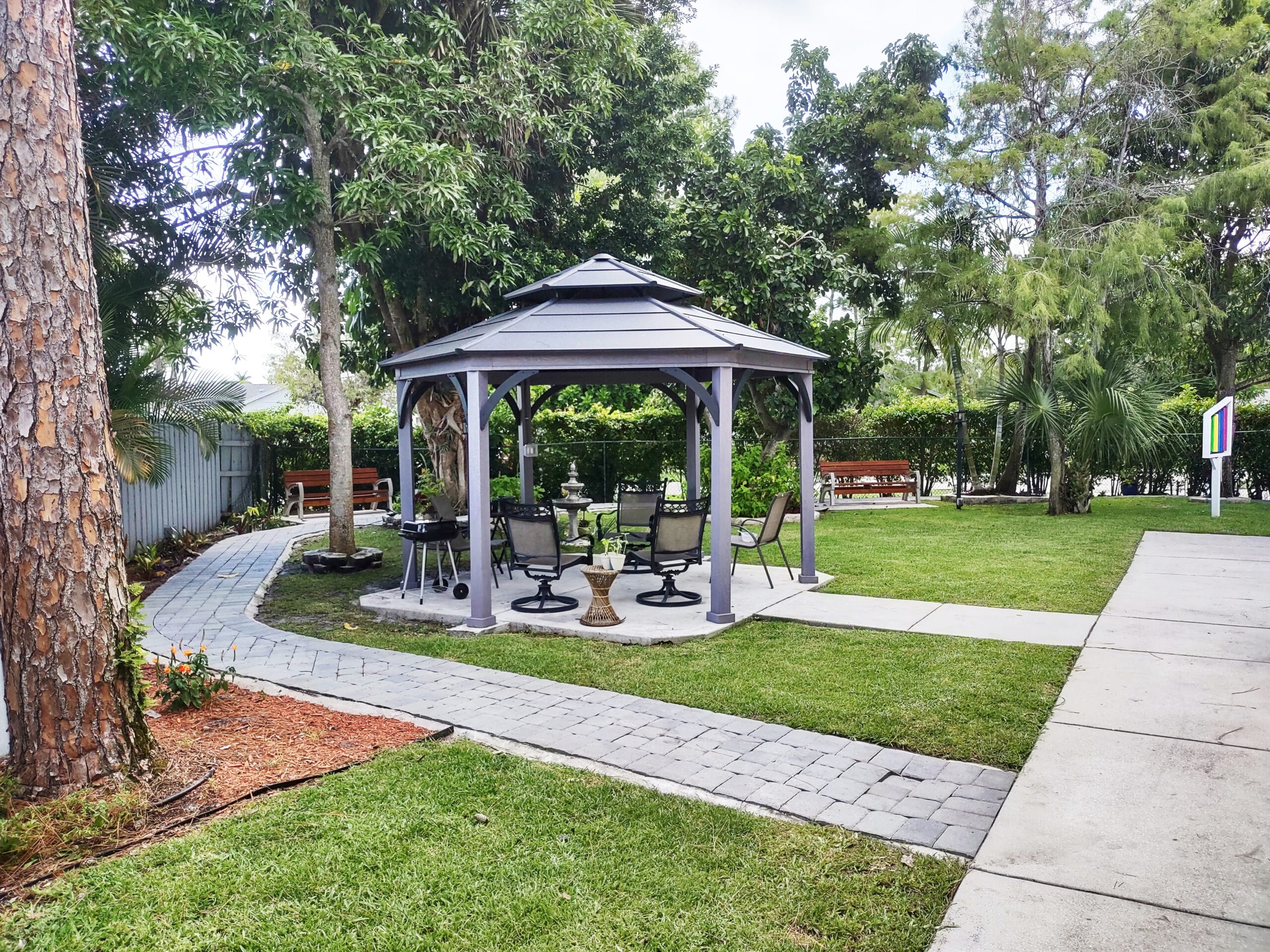 outdoor seating under gazebo at Mama Llama Assisted Living outdoor seating under gazebo at Mama Llama Assisted Living