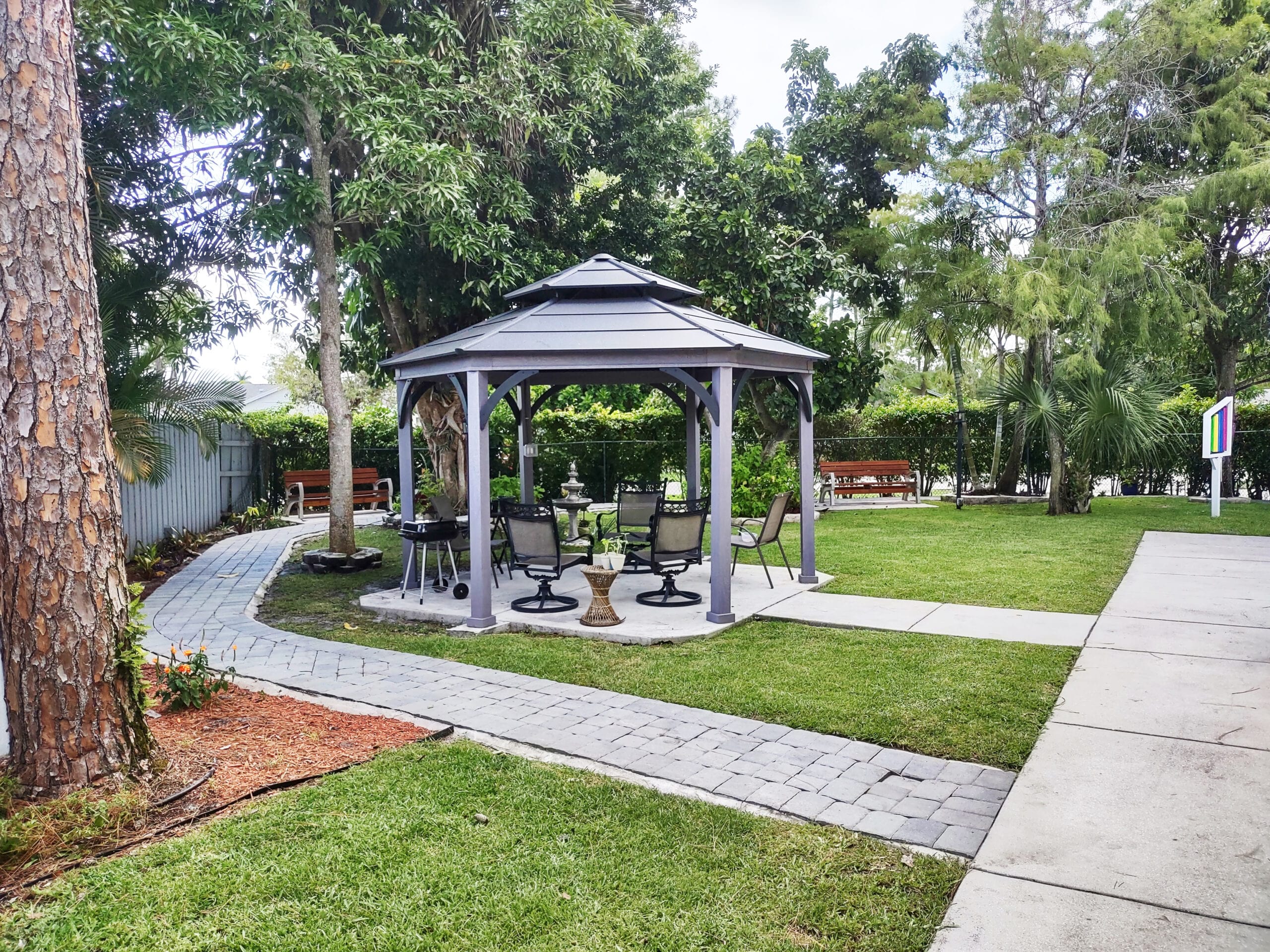 outdoor seating under gazebo at Mama Llama Assisted Living