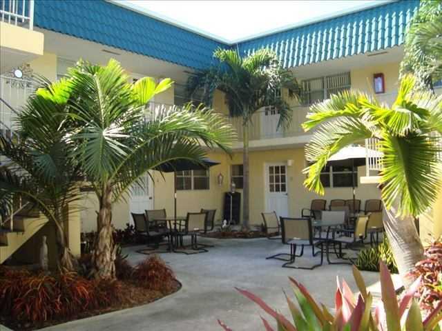 outdoor seating and dining area at Villa Rio Vista